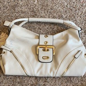 White handbag purse tote gold accessories